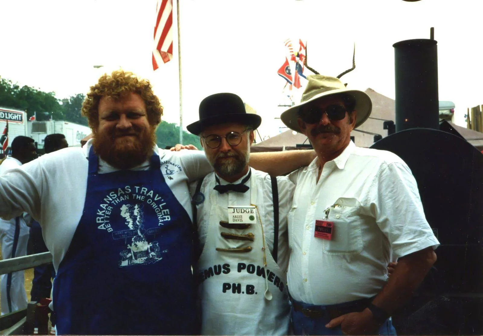 Jim Quessenberry wearing his Arkansas Trav'ler apron at a BBQ competition